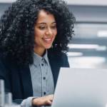 Woman in office on laptop