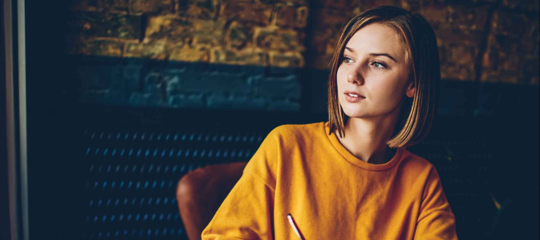 Thoughtful businesswoman pondering on strategy