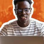 Black man watching educational webinar on laptop, studying, preparing for exam, talk in video chat.
