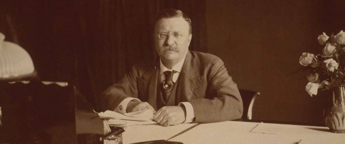 President Theodore Roosevelt (1858-1919), at his desk, 1907.