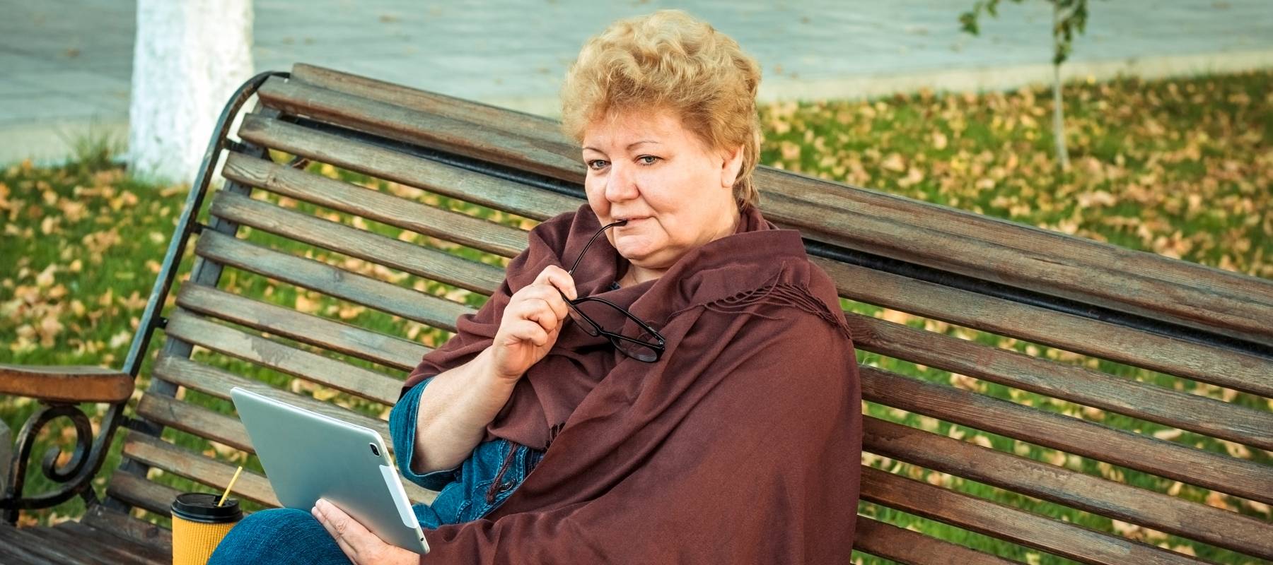 Seniors looks at tablet