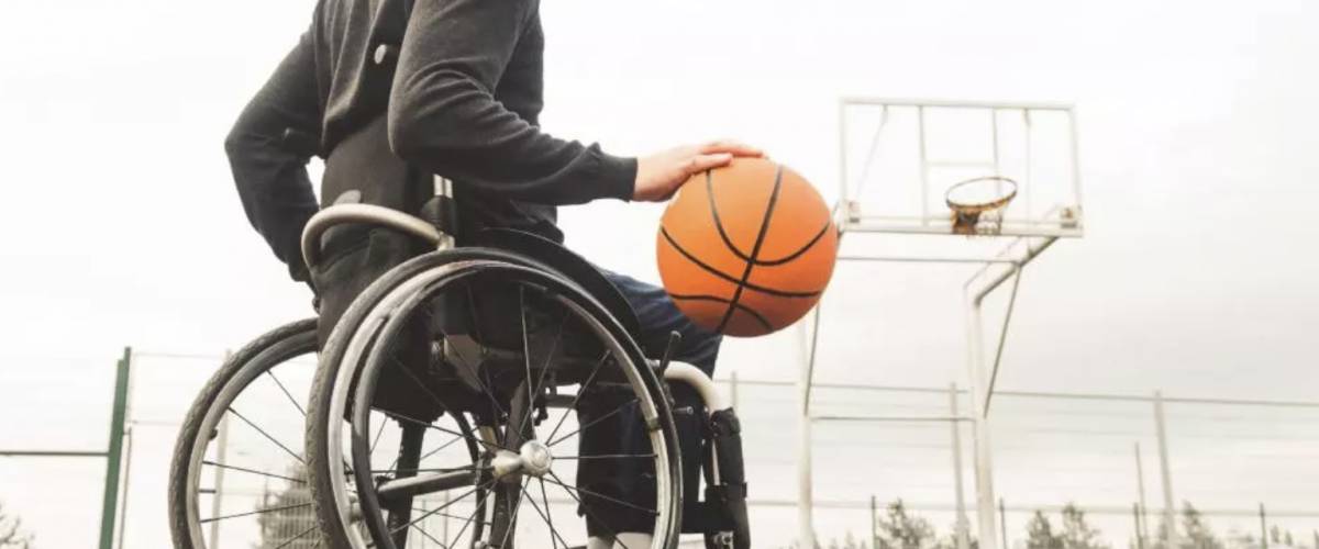 Playing basketball in wheelchair