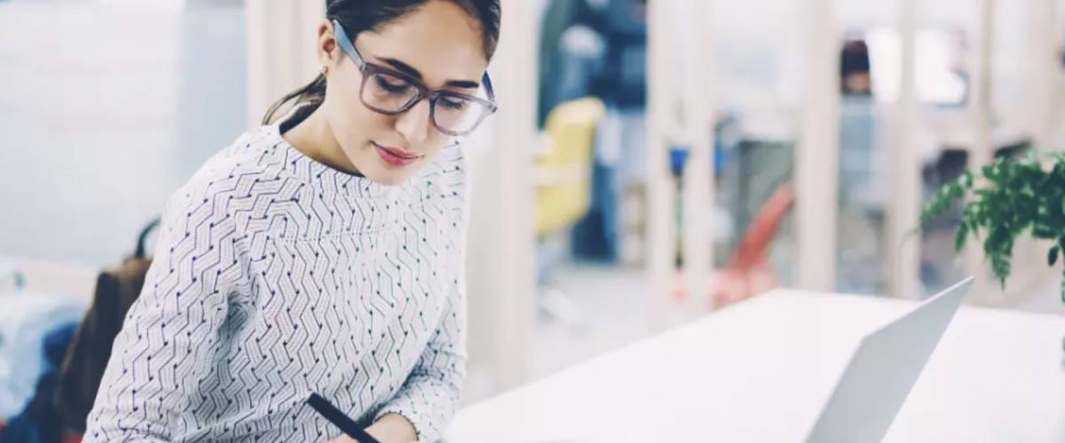 Office administrator at laptop