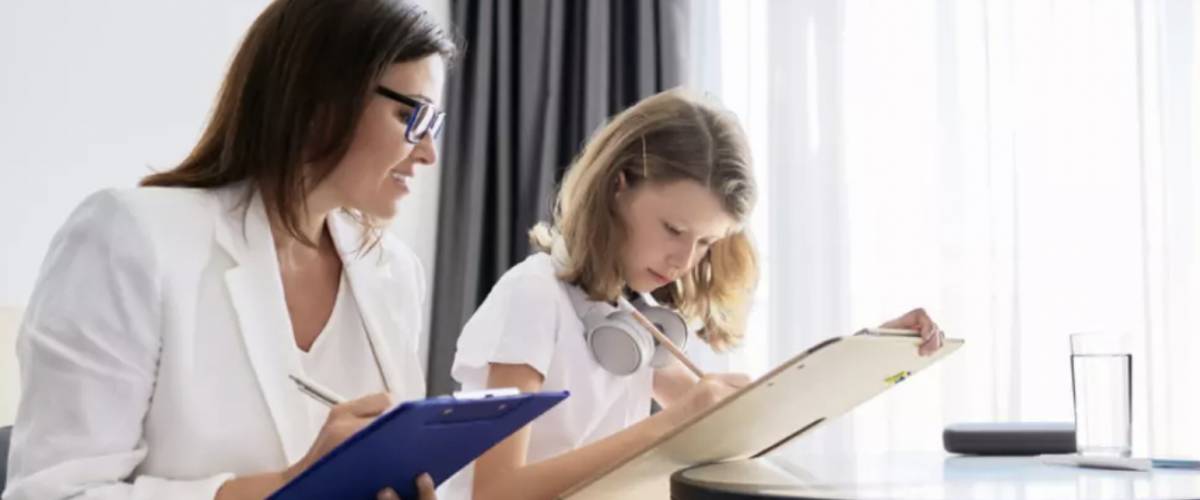 Educational psychologist with client