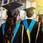 College graduates in cap and gown