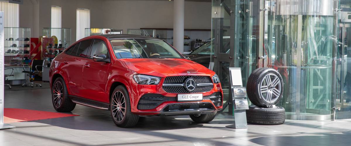 New cars indoors on display in Mercedes-Benz