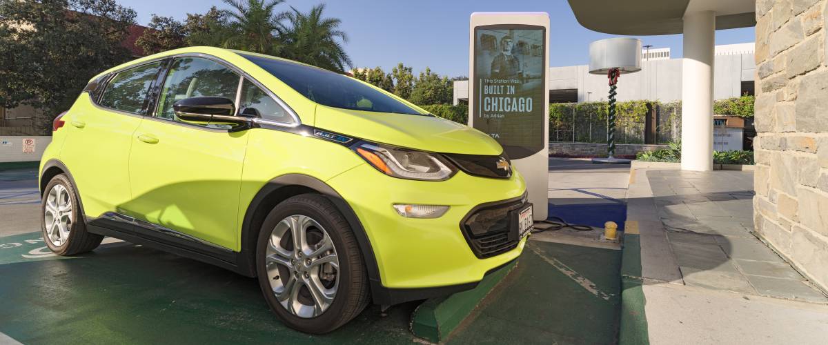 Image of a Chevrolet Bolt EV shown at a free recharging station.