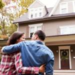 Rear View Of Loving Couple Walking Towards House