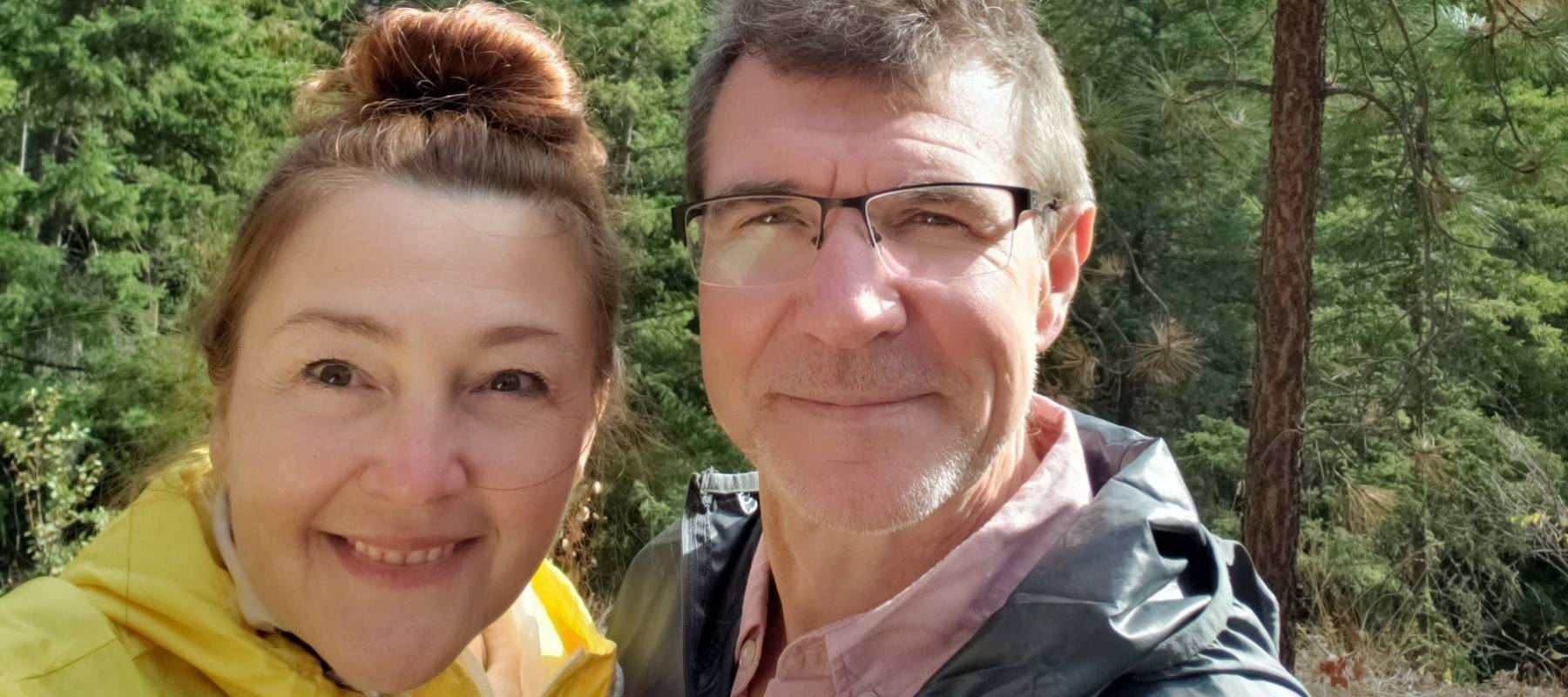 Mature couple in hiking in the woods