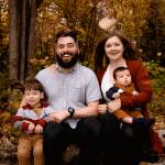 Family photo in the fall leaves