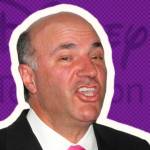 Kevin O'Leary in the middle of saying something standing in front of a Disney backdrop.