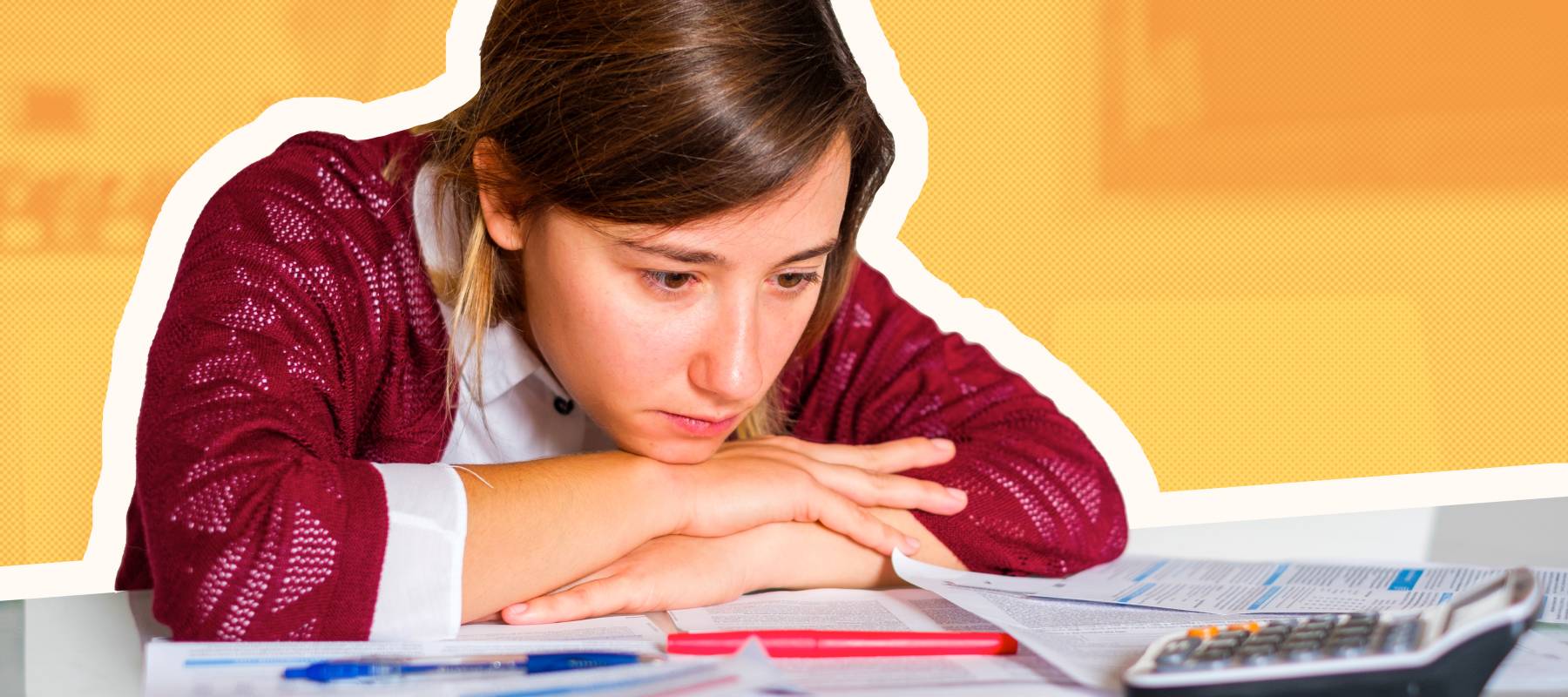 Sad woman with many debts calculating family income