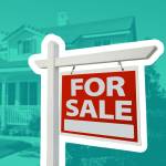 Home For Sale Sign in Front of New House.