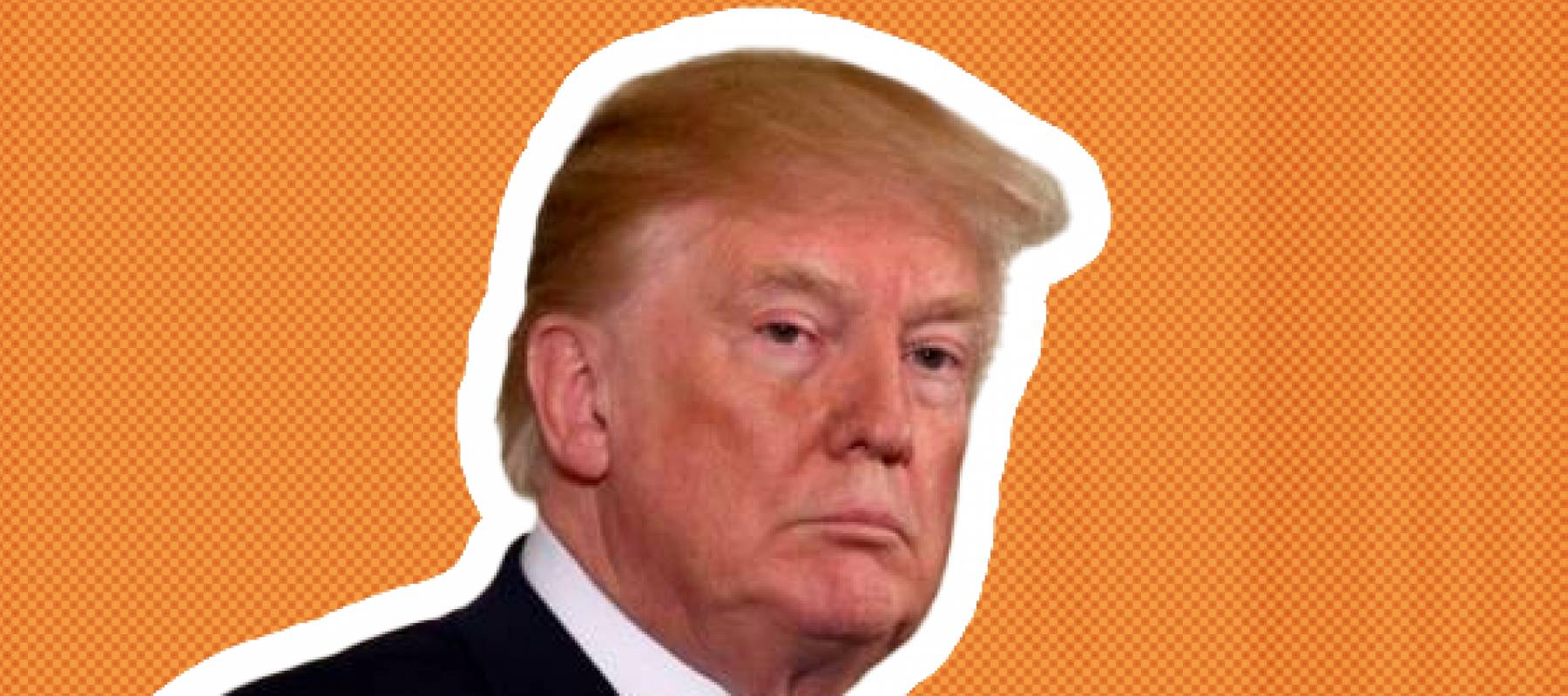 President Donald Trump pauses as he speaks at a joint press conference with German Chancellor Angela Merkel in the East Room of the White House