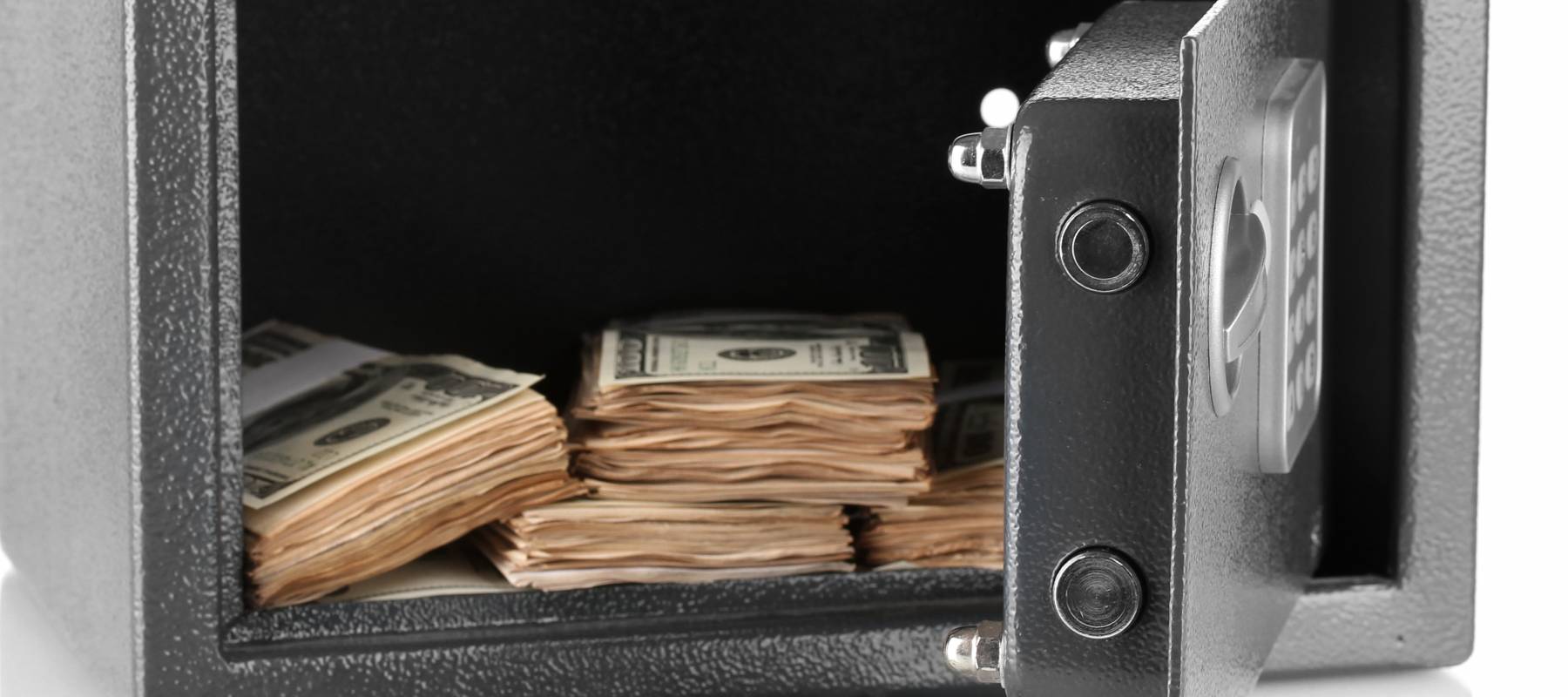 Money in open safe isolated on white, concept