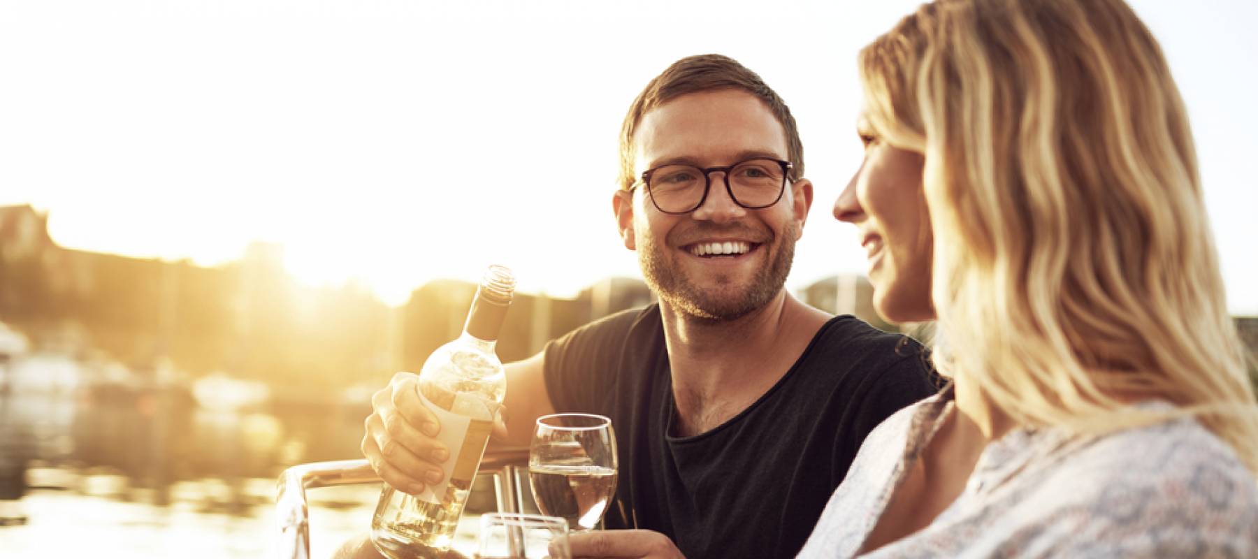 Man and Woman Drinking Wine Outside a Summer Day