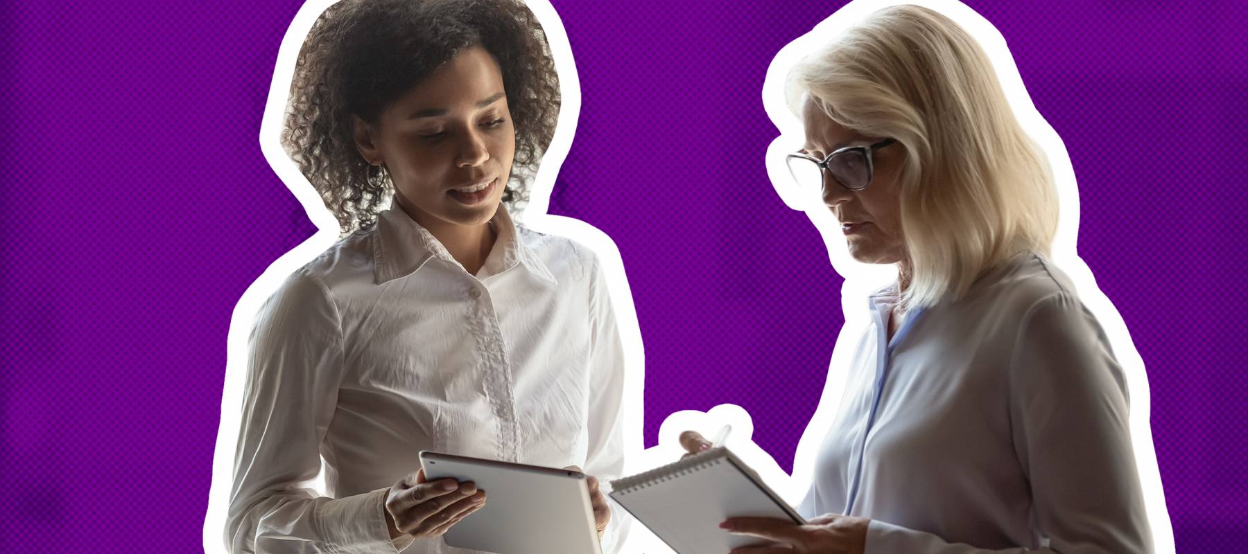 Younger employee talking to older employee