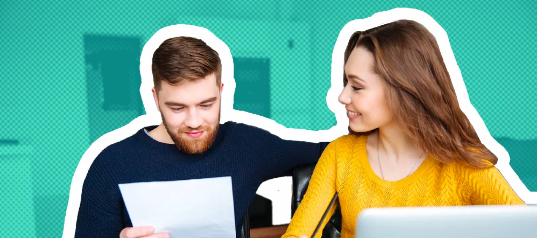 Young couple sit at dining room table, looking at papers and laptop and smiling.