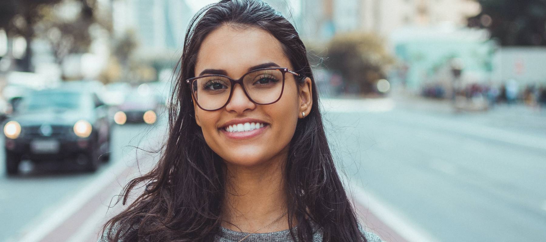 Smiling woman in street