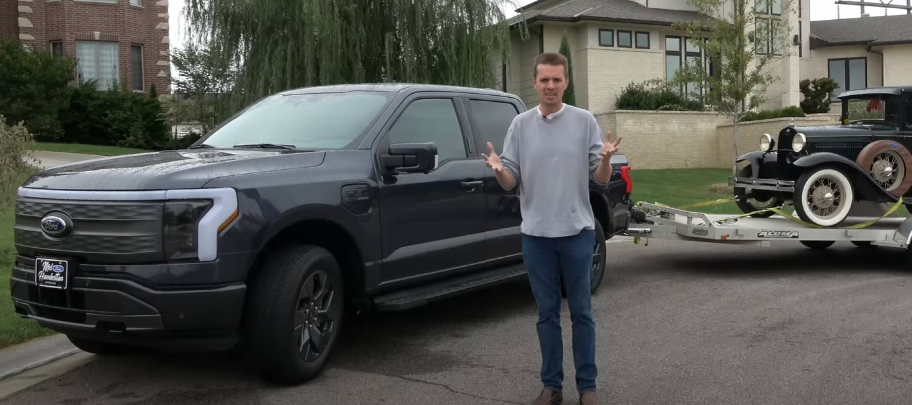 Tyler Hoover standing in front of Ford F150 Lightning