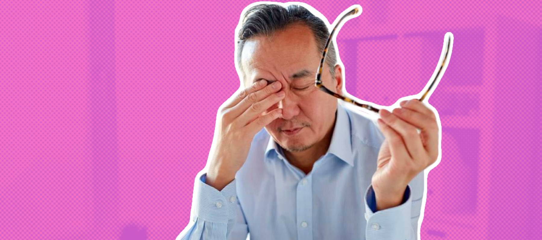 tired businessman with eyeglasses and laptop computer rubbing eyes at office