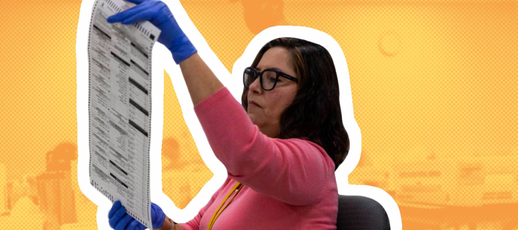 Election workers sort ballots at the Maricopa County Tabulation and Election Center on November 09, 2022 in Phoenix, Arizona.
