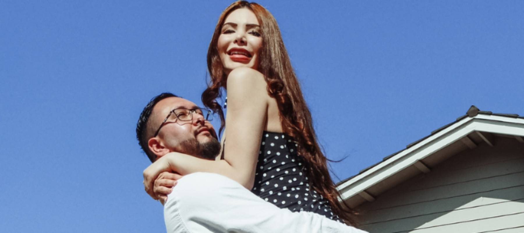 Happy couple at their house