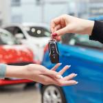 car keys exchanging hands