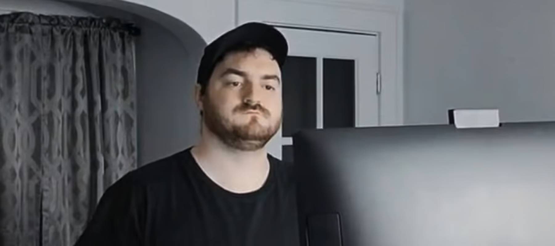 Ryan Halbert speaks straight on to the camera.