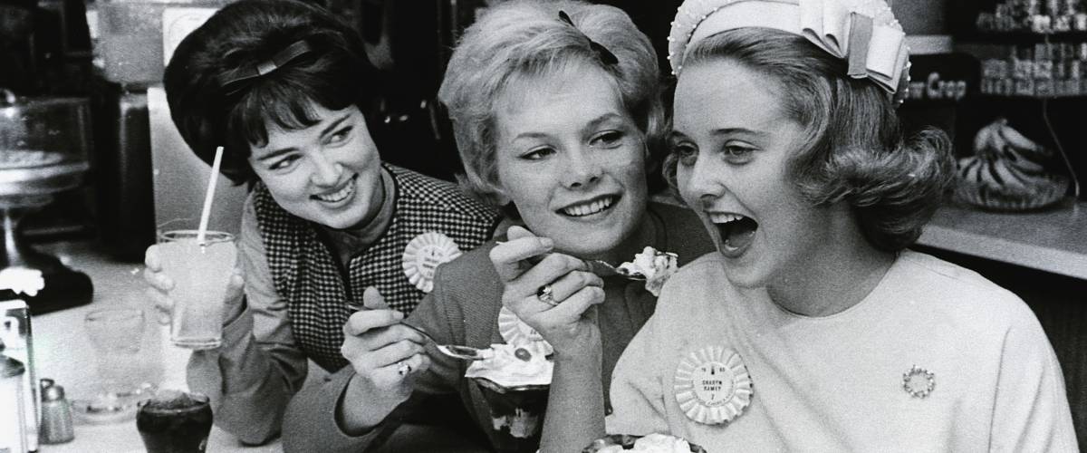 Girls at a malt shop counter