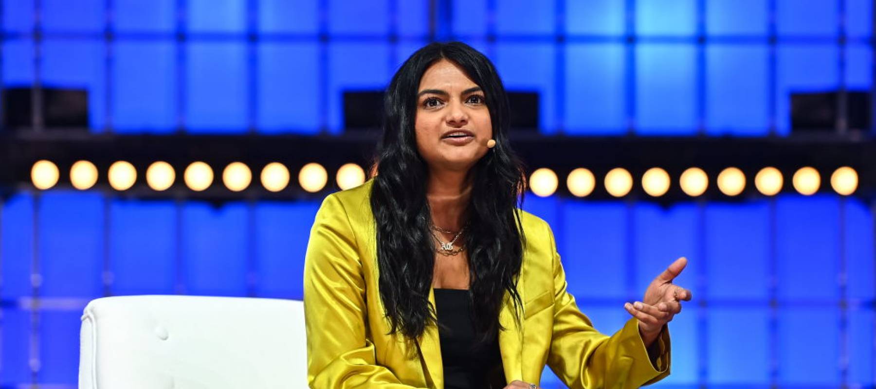 CEO of OnlyFans, Amrapali Gan, speaks on stage at a conference.