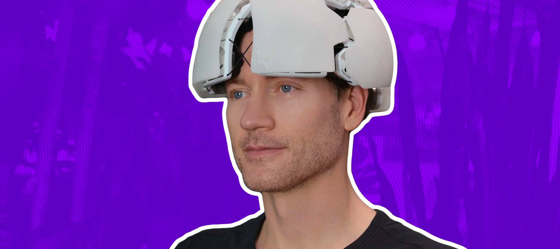 Bryan Johnson seen close up wearing a helmet.