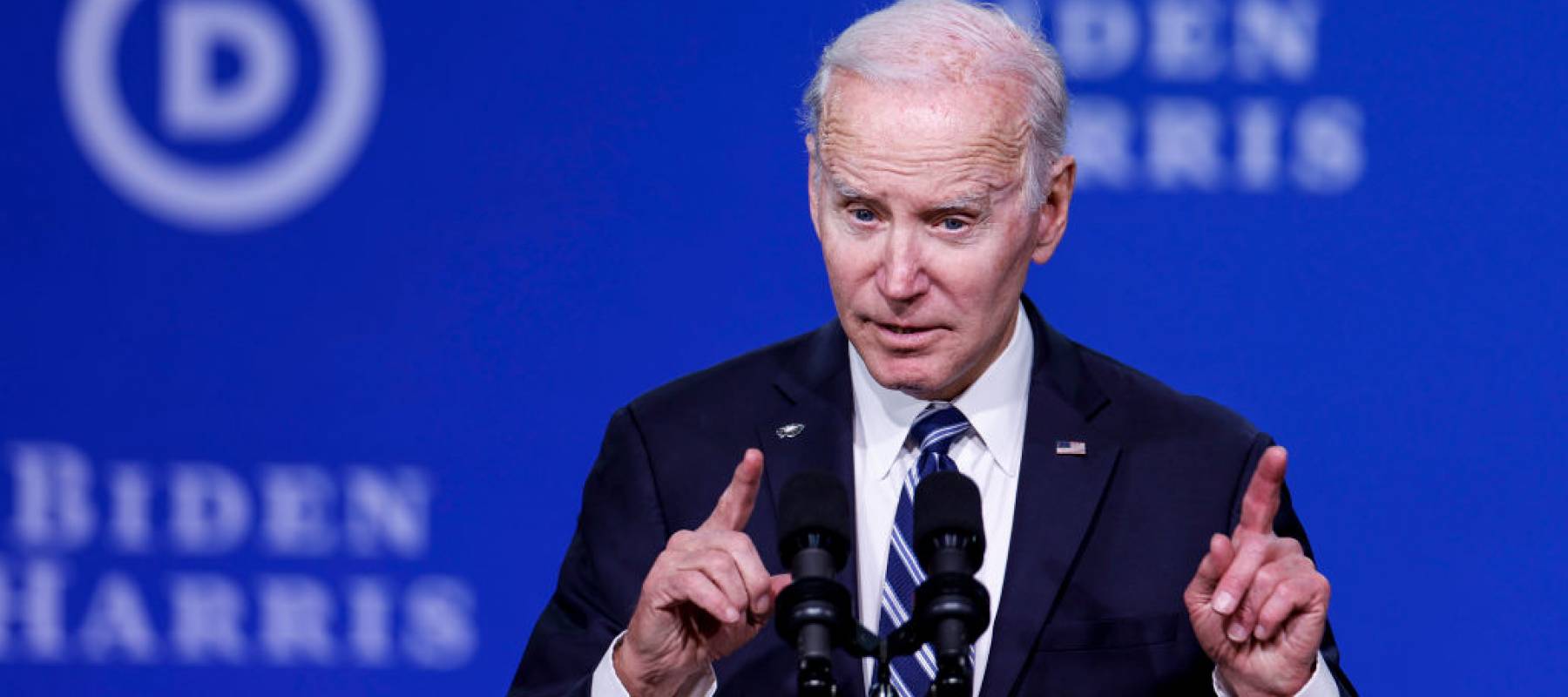 U.S. President Joe Biden speaks during the Democratic National Committee winter meeting on stage in Philadelphia, Pennsylvania.