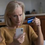Older woman with credit card
