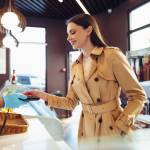 Woman pays by credit card