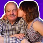 A happy girl kisses her dad on the cheek. Payment of debts or education of their children