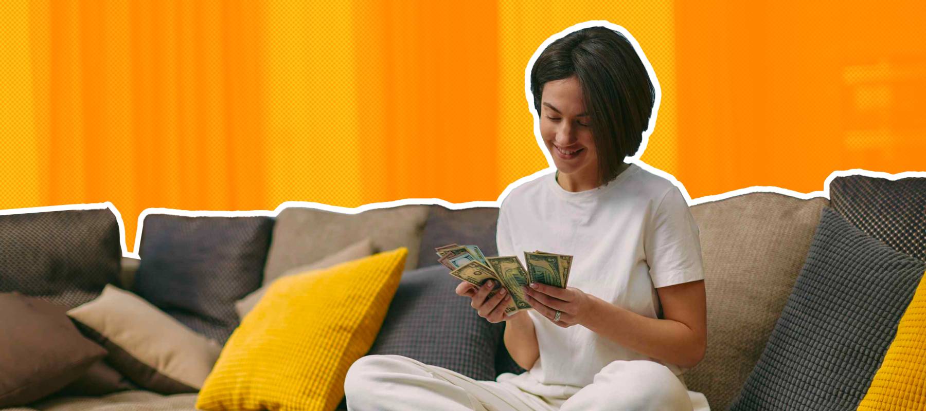 Happy young woman counting cash, enjoying money win, big profit, salary in payday sitting on sofa at home