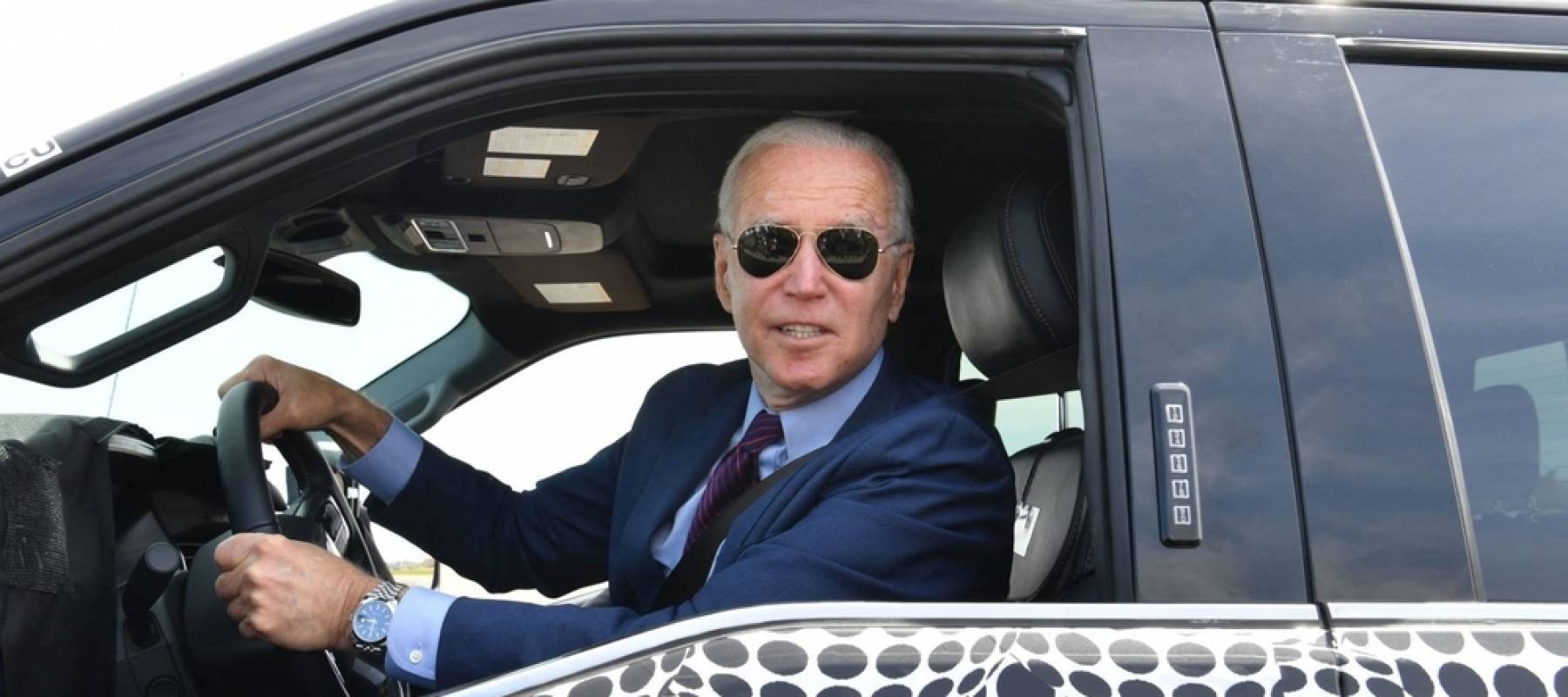 US President Joe Biden drives the new electric Ford F-150 Lightning