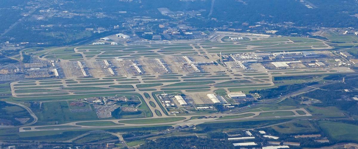 Aerial view of the multiple runways and terminals at Atlanta's Hartsfield-Jackson airport.