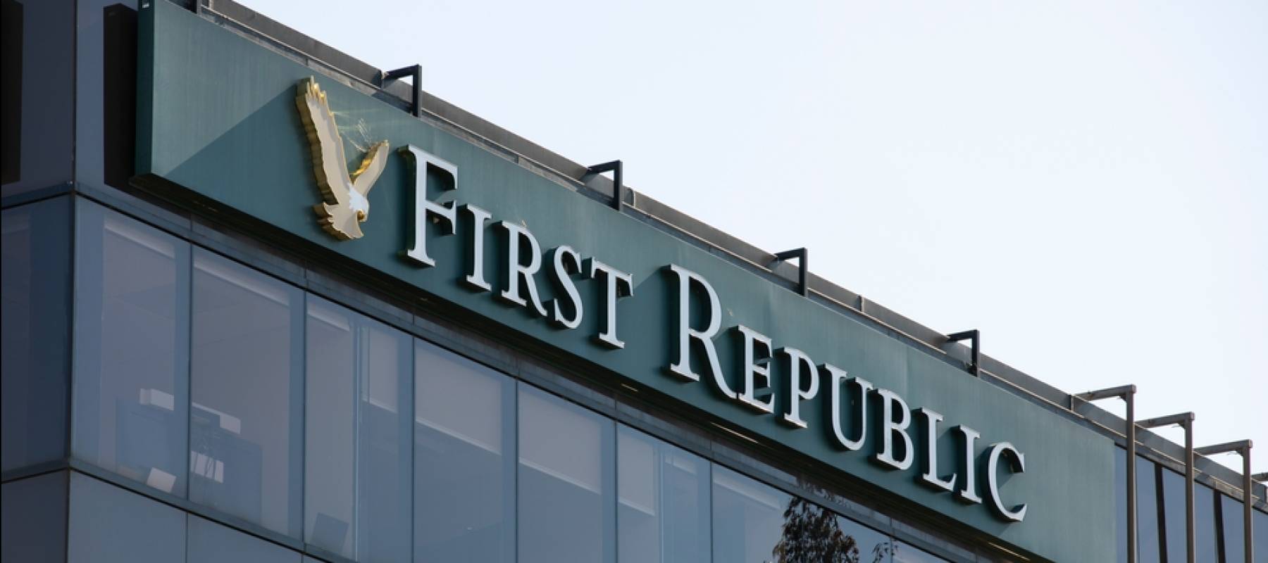 Afternoon sunlight shines on a branch of the First Republic Bank, the latest third largest bank to collapse in America.