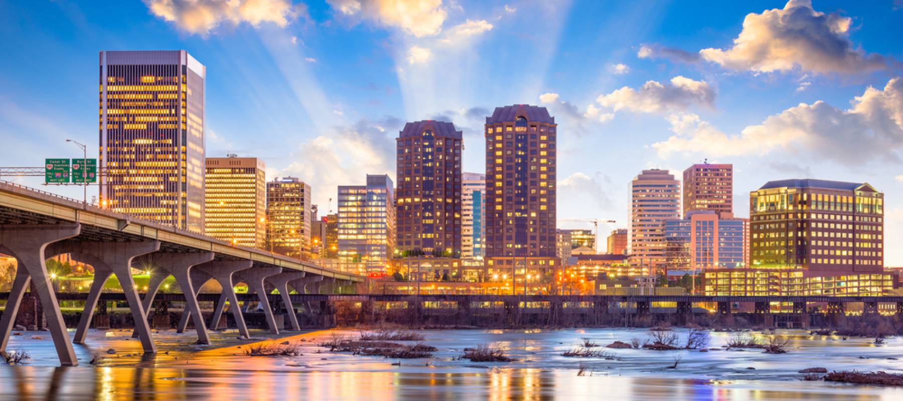Richmond, Virginia, USA downtown skyline on the James River.