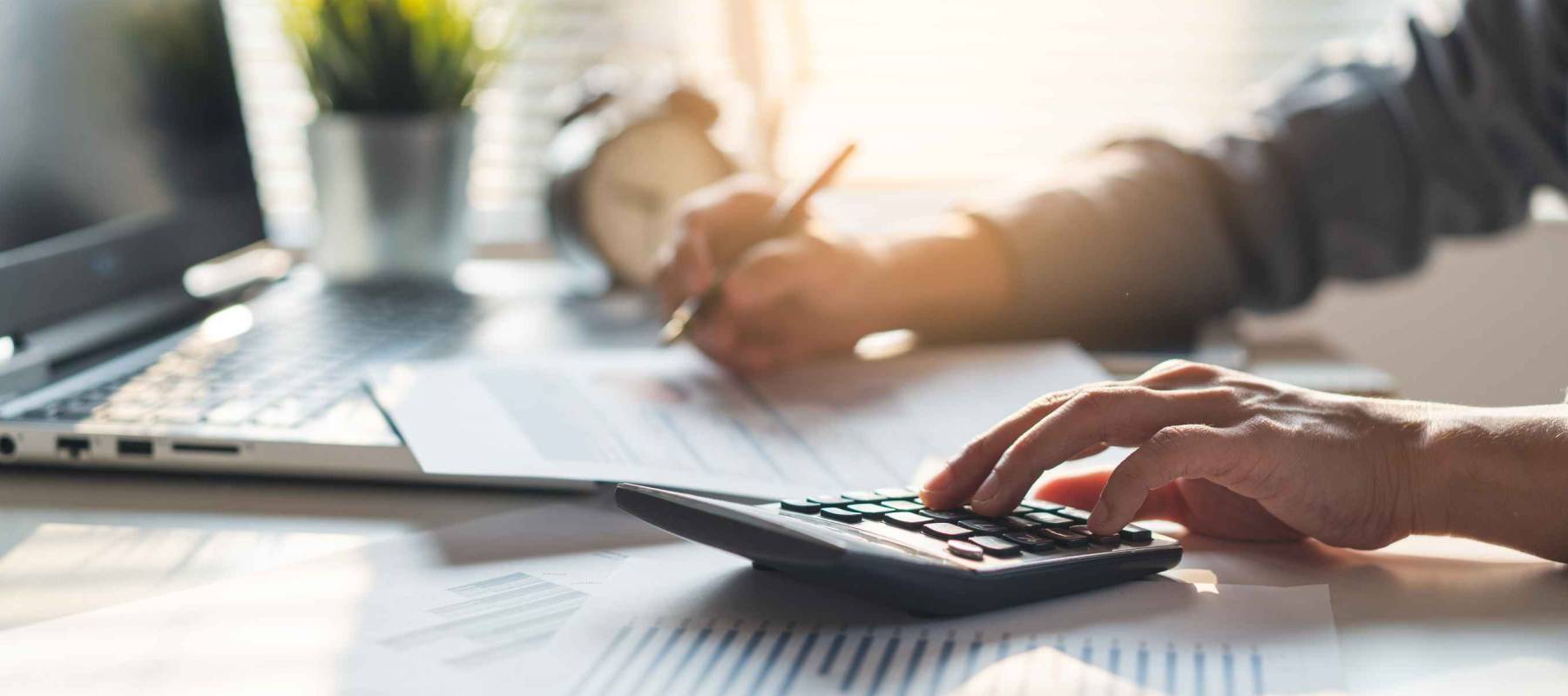 Tax deduction planning concept. Businessman calculating business balance prepare tax reduction.