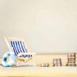 Miniature Beach Chair with Increasing Stacks of Coins