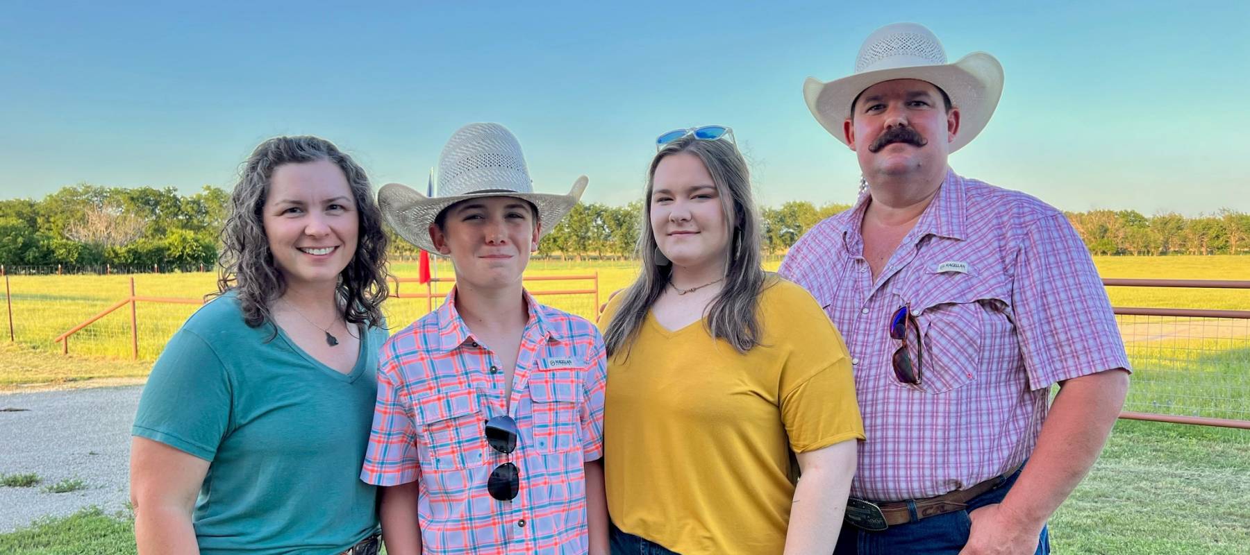 Cody and Erika Archie flank their children, Clancy and Kylee.