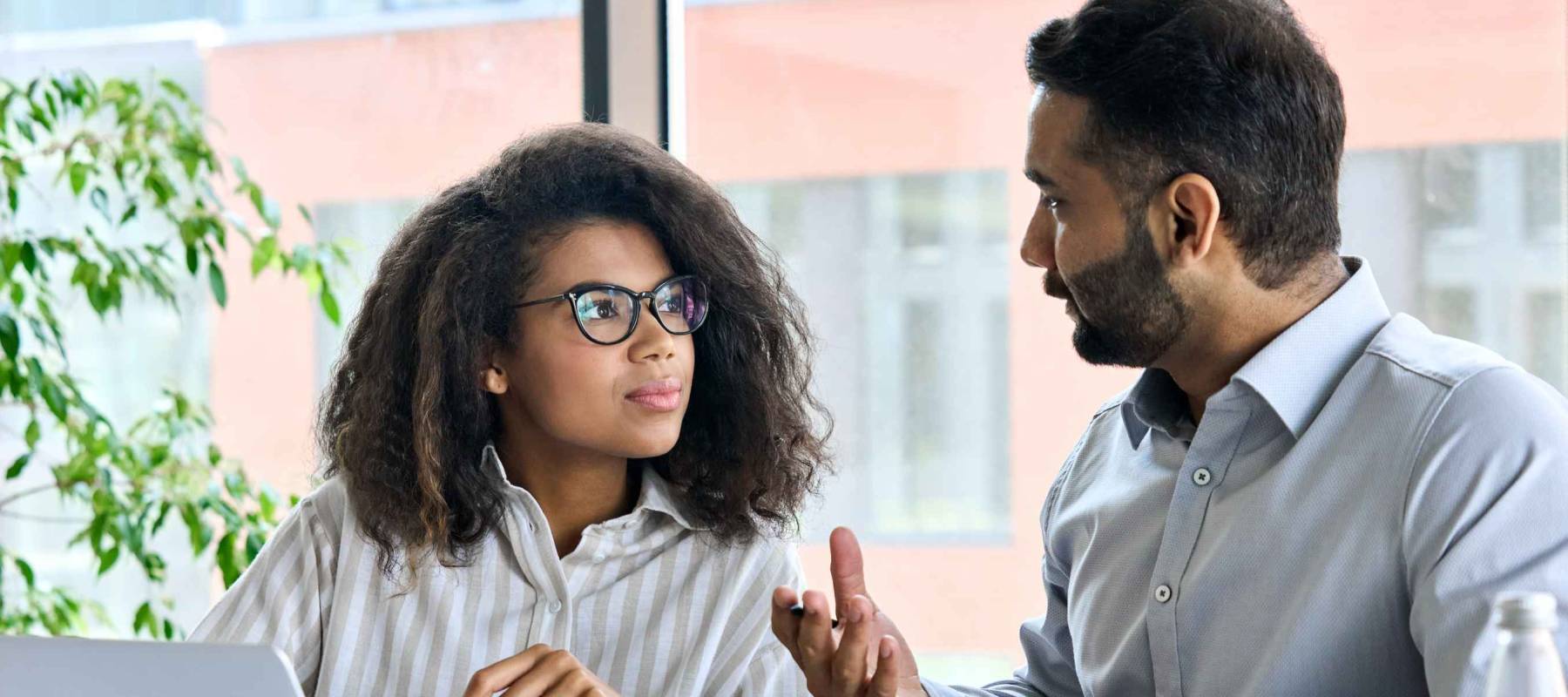 Businessman indian executive manager ceo talking to female