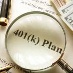 Document with title 401k plan on a table.