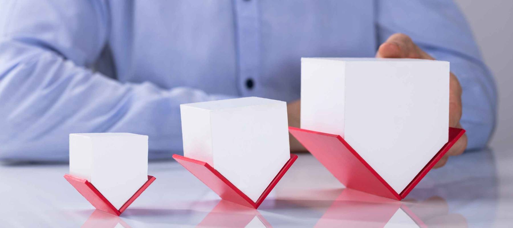 Photos Of Businessman Flipping Houses. Real Estate Concept