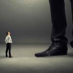 small businessman looking at his big boss