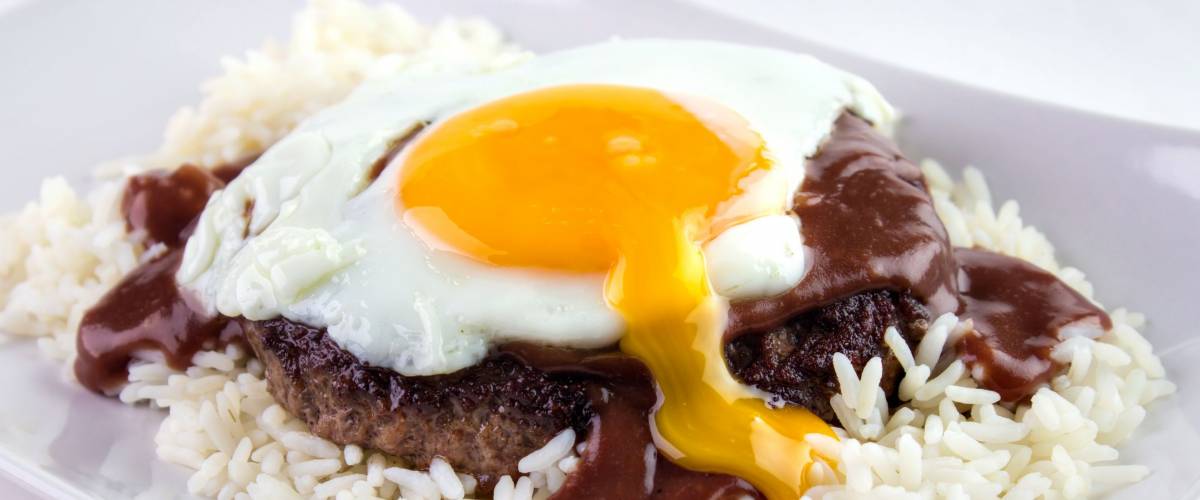 Loco Moco , traditional Hawaiian cuisine , burger patty on rice with a fried egg and brown gravy sauce