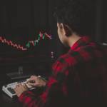 Stock investor with stock market graph screen, stock fluctuation analysis, business man trading stocks for profit, stock market fluctuation graph screen, profit trading analysis.